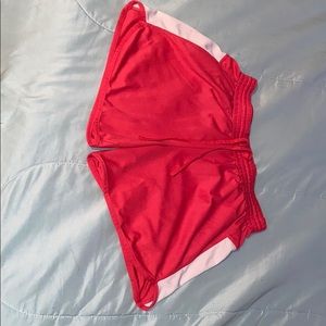 Pink and white active wear shorts